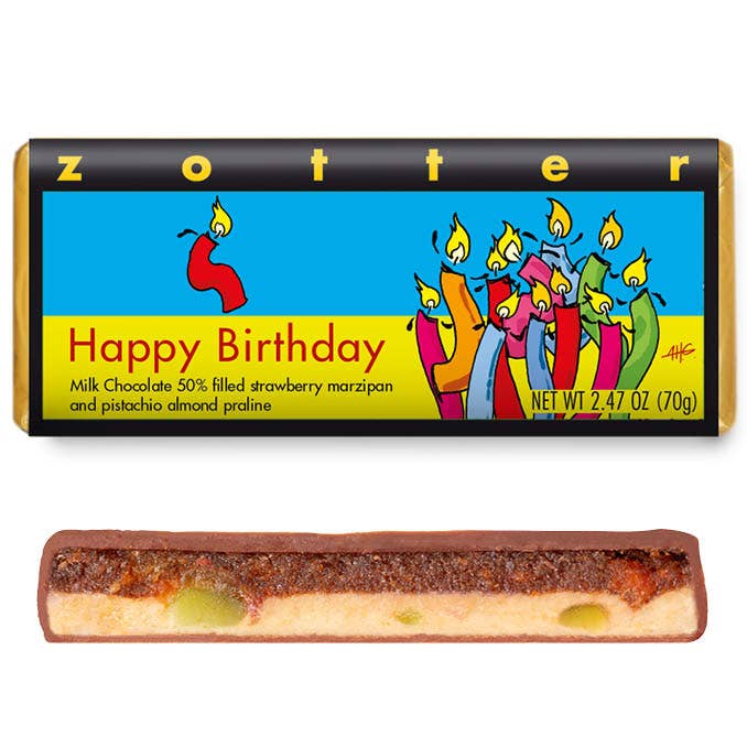 A wrapped and unwrapped Happy Birthday Strawberry Marzipan with Pistachio Praline bar against a white background