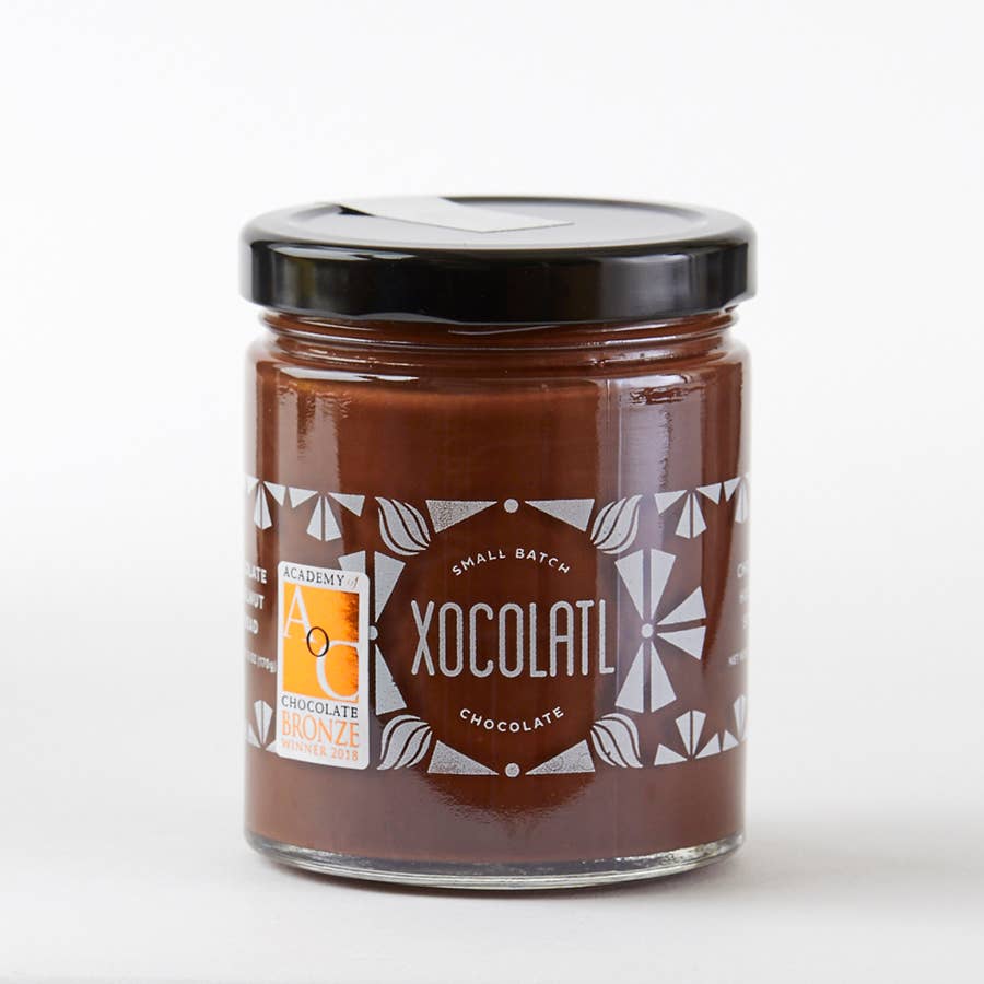 Chocolate Hazelnut Spread in a jar against a white background