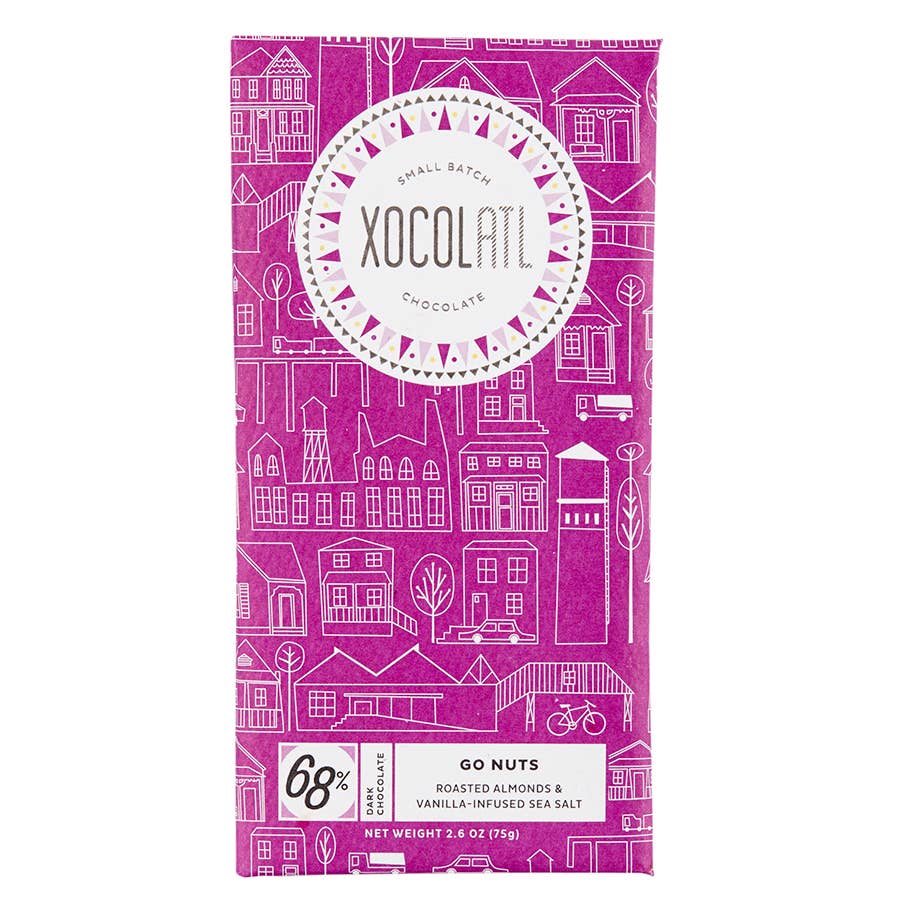 Go Nuts: 68% dark chocolate with roasted almonds & sea salt bar against a white background