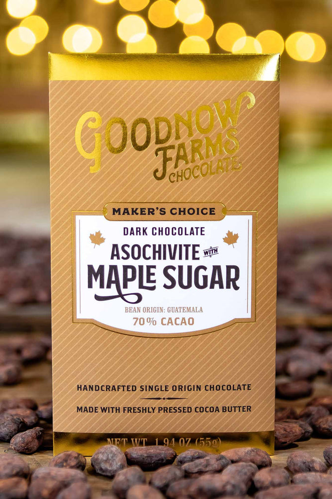 Asochivite with Maple Sugar 70% on a table with cocoa beans