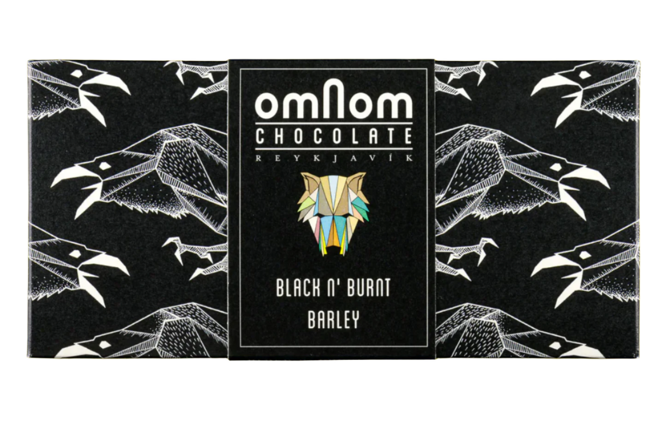 The front of OmNom Chocolate's wrapped Black n' Burnt Barley chocolate bar with a white background.