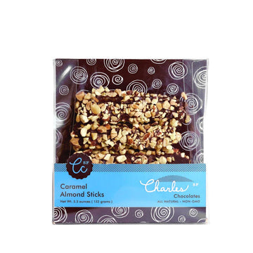 Wrapped Caramel Almond Sticks in clear packaging from Charles Chocolates, with a white background.