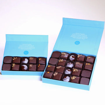 Holiday Collections on a white shelf from Charles Chocolate