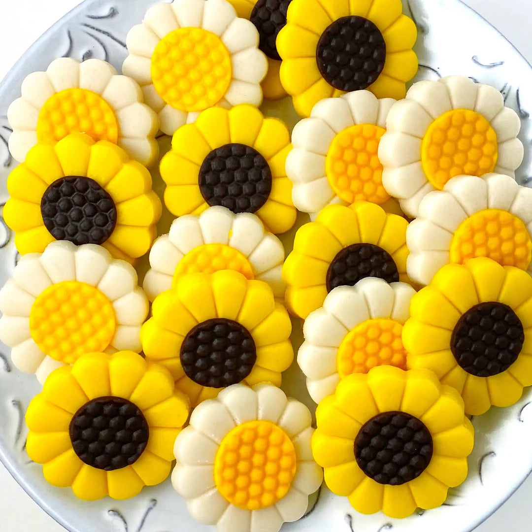 Marzipan Daisy & Sunflowers on a plate on a white table