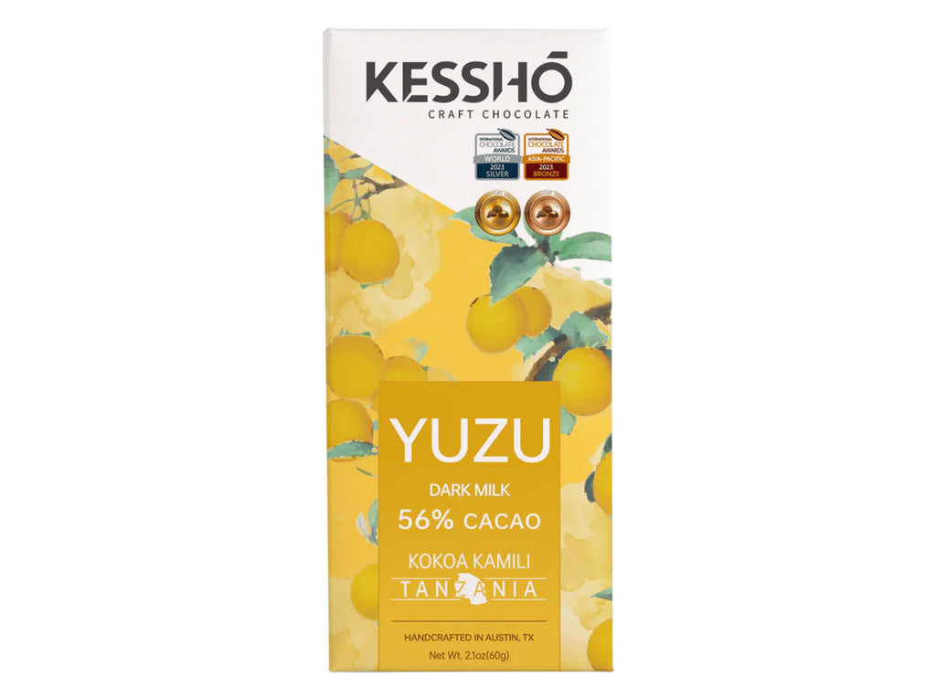 The front of a KESSHO wrapped Yuzu 56% Dark Milk back against a white background