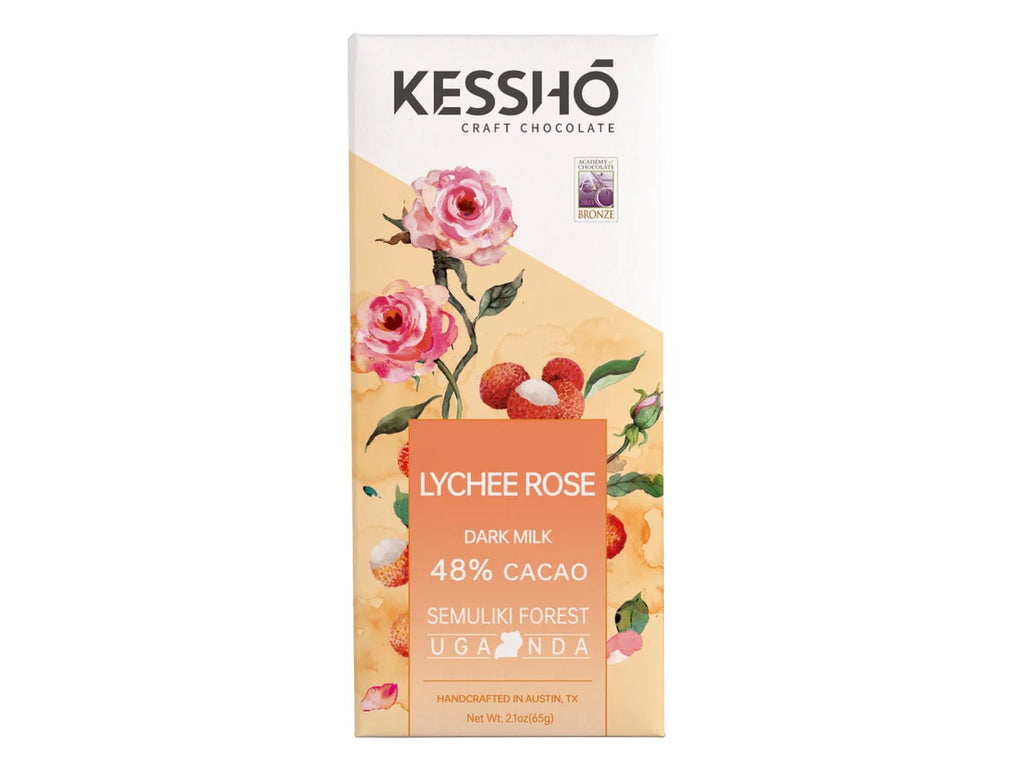 The front of a KESSHO wrapped Lychee Rose 48% Dark Milk Cacao bar against a white background