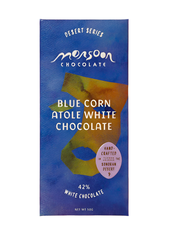 Wrapped Blue Corn Atole 42% White Chocolate bar against a white background