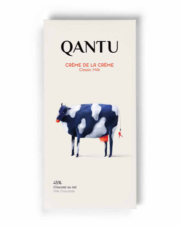 The front of Qantu Chocolate's wrapped Creme De La Creme 45% Classic Milk Bar with a white background.