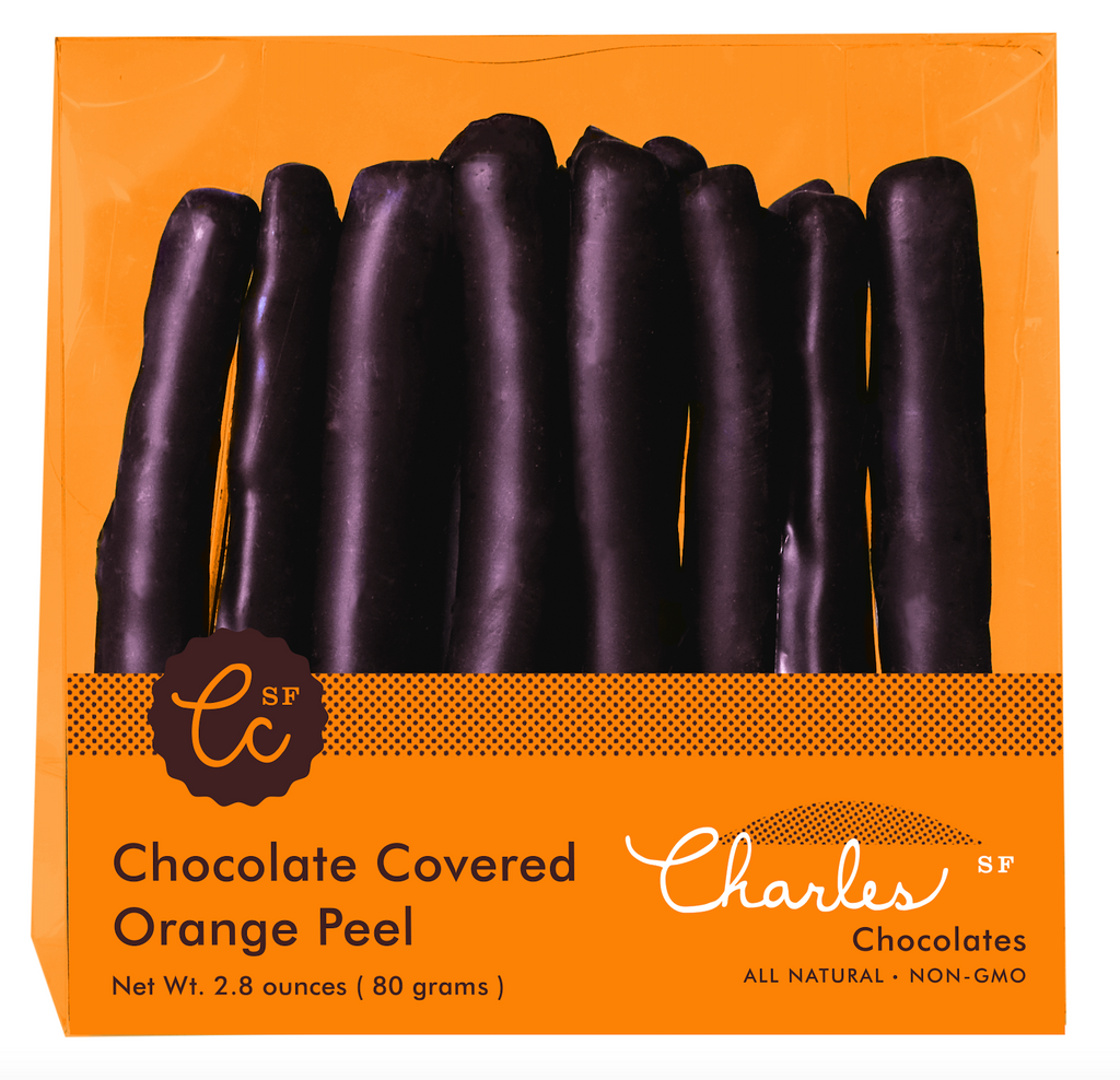 Chocolate Covered Orange Peels from Charles Chocolates in an orange packaging, against a white background.