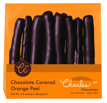 Chocolate Covered Orange Peels from Charles Chocolates in an orange packaging, against a white background.