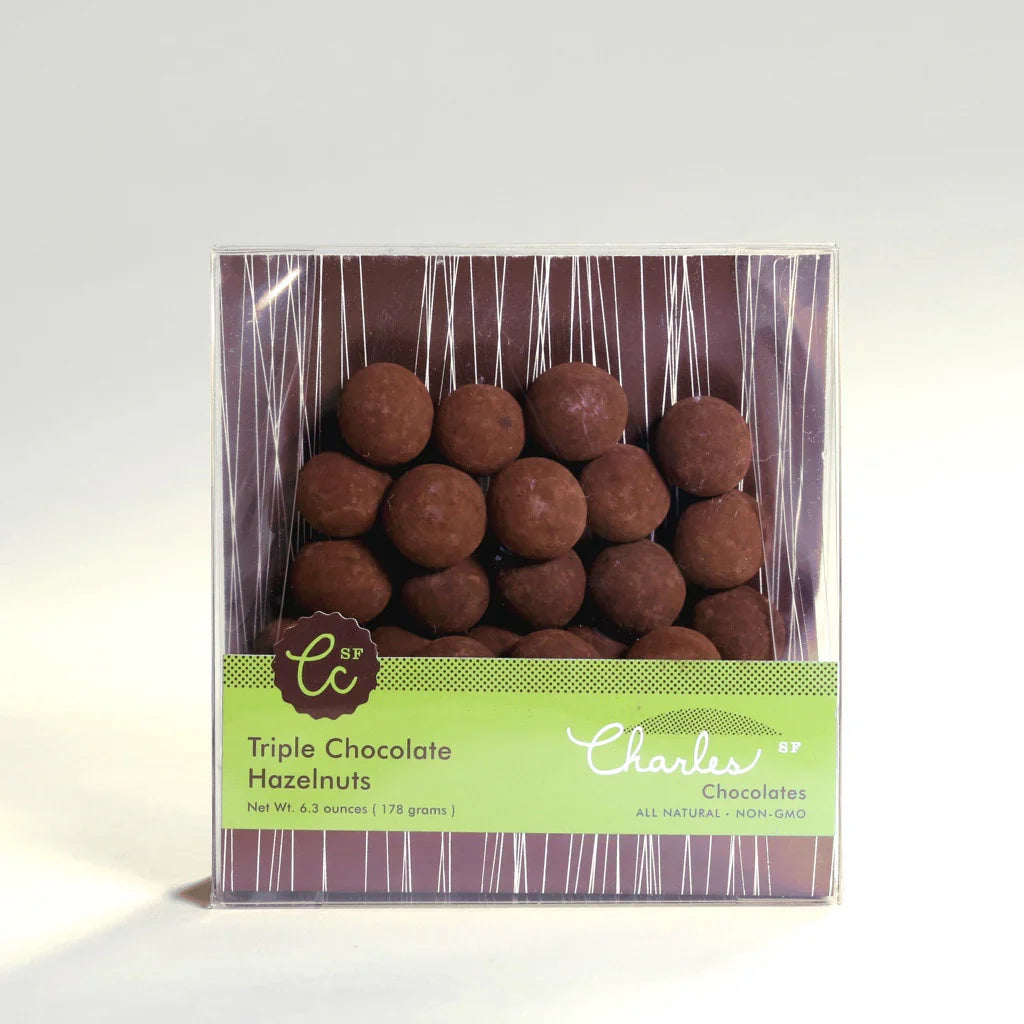 Wrapped Triple Chocolate Hazelnuts against a white background