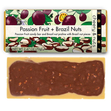 A wrapped and unwrapped Passion Fruit + Brazil Nuts bar against a white background