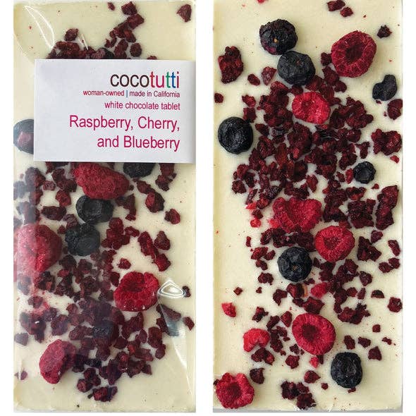 Wrapped and unwrapped White Chocolate Bar with Raspberry, Cherry, and Blueberry from CocoTutti.