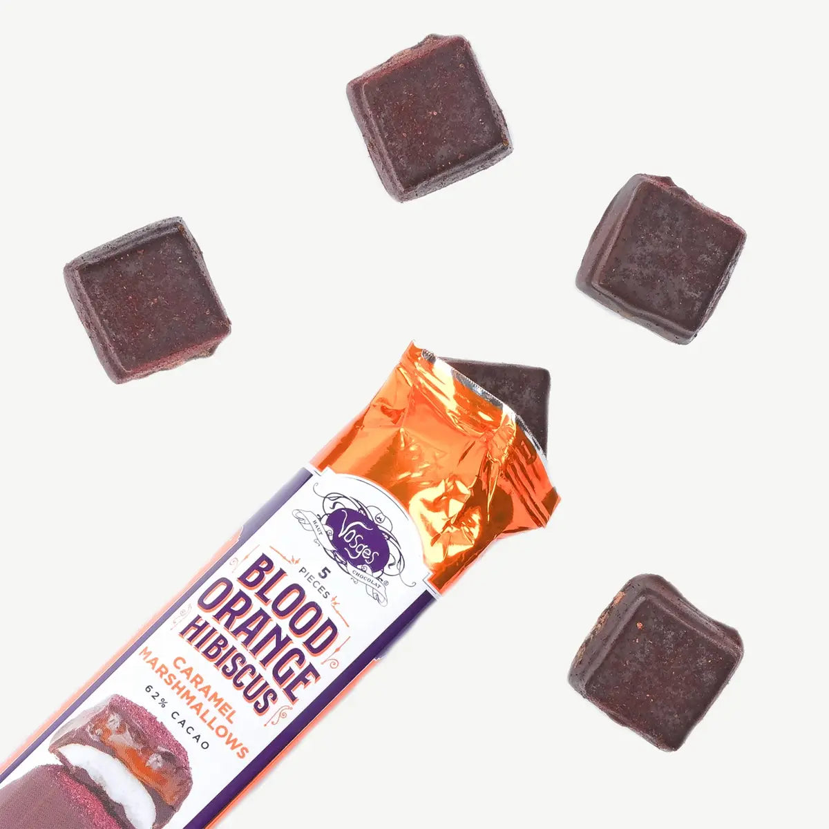Dark Chocolate Marshmallows w/ Blood Orange Hibiscus Caramel against a white background