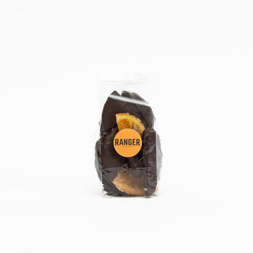 Dark Chocolate Candied Oranges against a white background