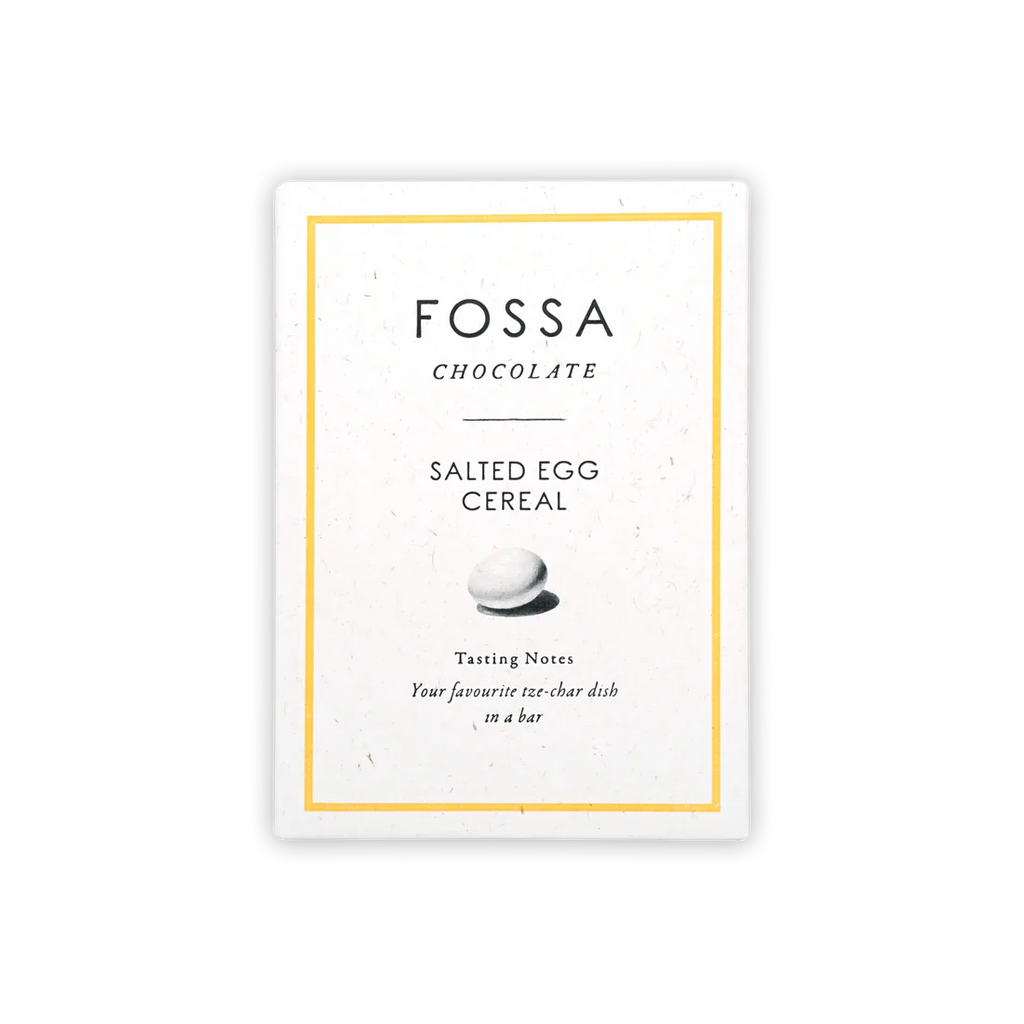 The front of a wrapped Salted Egg Cereal Blond Chocolate bar from Fossa Chocolate