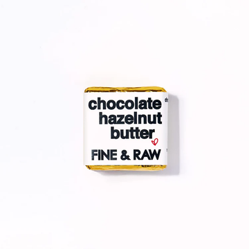 Fine & Raw Mini Hazelnut Chunky against a white background.